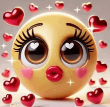 a smiley face with hearts around it and a kiss on its lips .