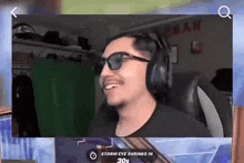 a video of a man wearing headphones and sunglasses with the words storm eye shrinks in 30s on the bottom