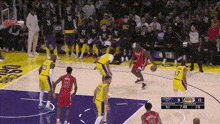 a basketball game is being played between the lakers and the heat