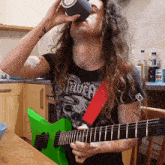 Playing A Guitar Bradley Hall GIF - Playing A Guitar Bradley Hall Drinking While Playing Guitar GIFs