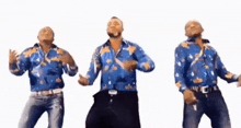 three men in blue shirts are dancing in a row .