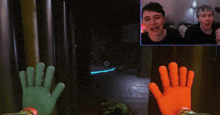 a man screams while playing a video game with a green and orange hand