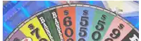 a close up of a wheel of fortune showing the numbers 7 9 and 10