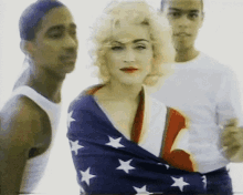 Madonna GIF - Madonna Flag Eyeroll GIFs