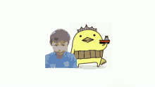 a boy in a blue shirt is standing next to a cartoon chicken with a crown on its head