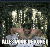 a shirtless man is wrapped in plastic and says alles voor de kunst on the bottom