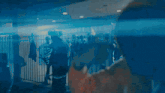 a blurry picture of a group of people with the word help in white