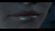 a close up of a person 's lips with a few white spots on them