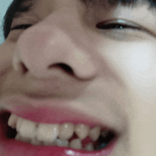 a close up of a person 's mouth and nose