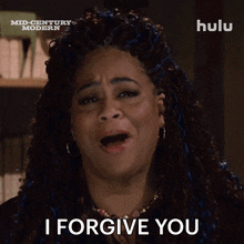 a woman says " i forgive you " in front of a hulu ad