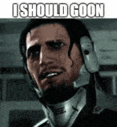 a man wearing a helmet and headphones is making a funny face with the words `` i should goon '' .