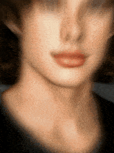 a blurry picture of a woman with red lips
