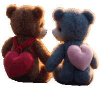 two teddy bears with hearts on their backs are holding hands