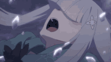 a close up of a girl with a cross on her head