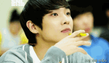 lee joon studying guessing playing with pen