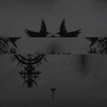 a black and white drawing of a circle with a triangle in the center