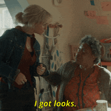 a woman talking to an older woman with the words i got looks written on the bottom