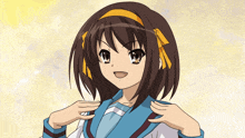 a girl with brown hair and yellow bows on her head is smiling