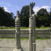 a photo of a statue with pixiz written on the bottom