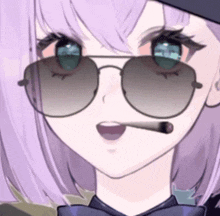 a girl with purple hair and sunglasses is smoking a cigarette .