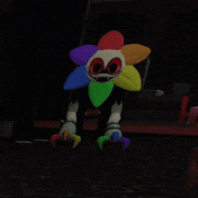 a cartoon character with a rainbow colored flower on his head