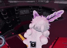a screenshot of a video game shows a white monster with purple wings and spikes