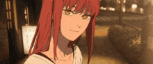 a girl with red hair and orange eyes is standing on a sidewalk