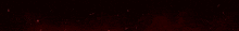 a red light is shining on a black background