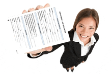 a woman in a suit is holding up a job application