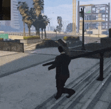 a man in a suit is walking down a set of stairs