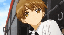 a close up of a boy 's face with the word kys on the bottom right corner