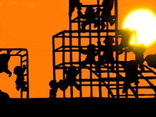 a silhouette of people climbing a ladder with the sun shining in the background