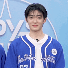 a boy wearing a blue jersey that says the north with ea on it