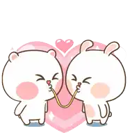 a couple of rabbits kissing in front of a heart
