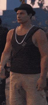 a man wearing a hat and sunglasses stands next to another man wearing a black tank top