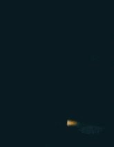 a blurred image of a sphere with a few spots of light on it