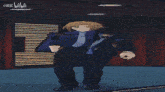 a man in a purple jacket is dancing in front of a sb sign