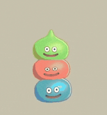 three cartoon characters are stacked on top of each other with smiley faces