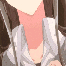 a close up of a person 's neck with a white shirt on