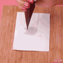 a person is holding a piping bag over a piece of wax paper with the words sp-plans written on the bottom