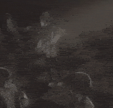 a group of anime characters are standing on a checkered floor in a dark room
