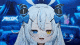 a close up of a girl 's face with a sign in the background that says ykkdk