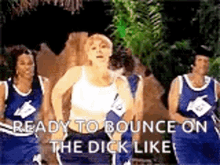 a group of women in basketball uniforms are standing next to each other and one of them is ready to bounce on the dick like .