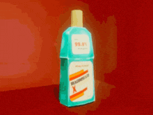 a bottle of 99.3% alcohol is sitting on a red background