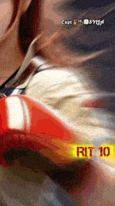 a blurry picture of a person with the number 10 on the bottom right