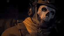 a man wearing a helmet and a mask with a skull on his face