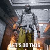 a man wearing a gas mask is standing in front of a fire and the words let 's do this are above him