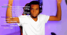 a man wearing headphones and a white shirt is sitting in front of a screen that says " want to support the stream "