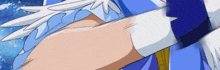 a close up of a person 's arm in a blue and white dress