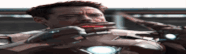 a man in an iron man suit is holding a gun in his mouth